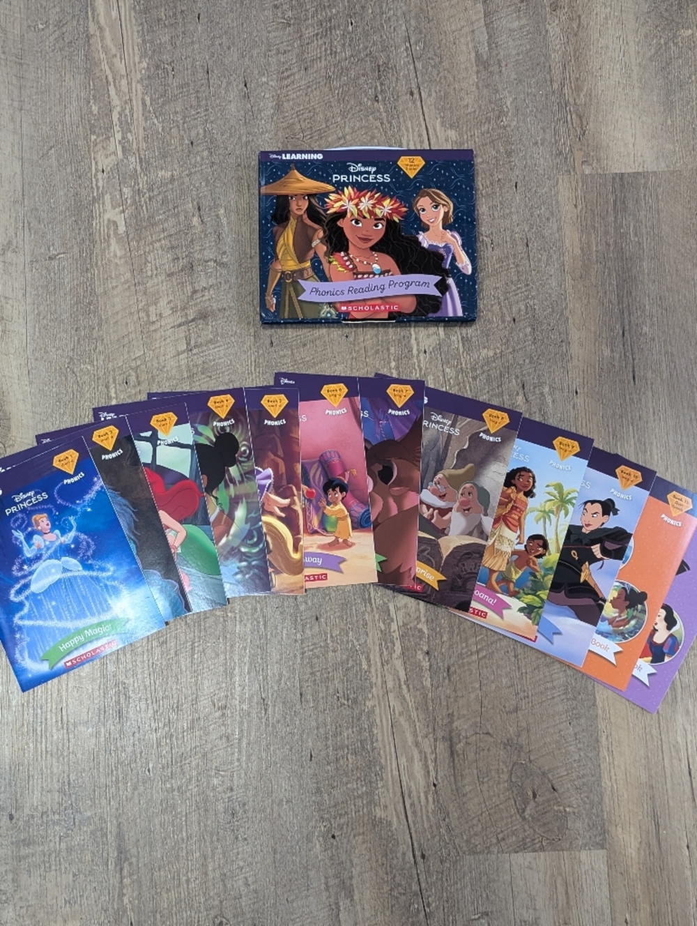 Scholastics Disney Princess Phonics Book Set. 10 Books And 2 Activity Books